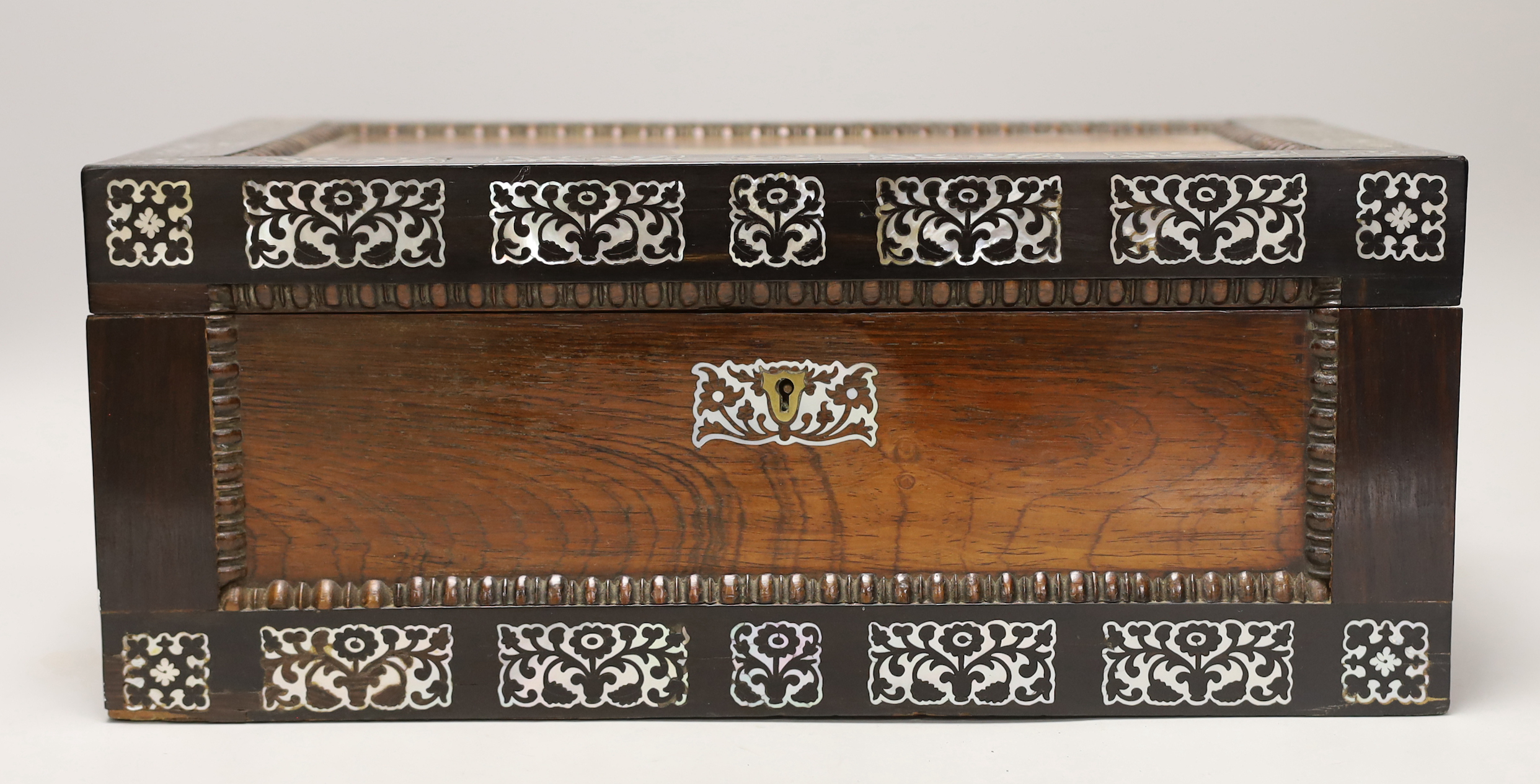 A Victorian rosewood, mother of pearl inlaid, writing slope, 40.5cm wide, 26.5cm deep, 17cm high